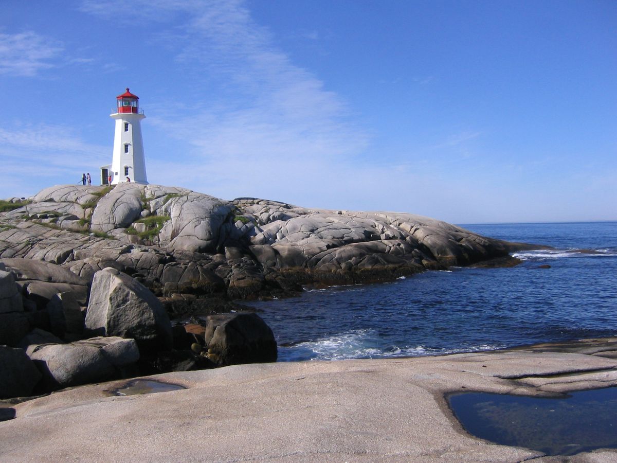 Peggy's Cove lighthouse on glacier-carved granite, Nova Scotia