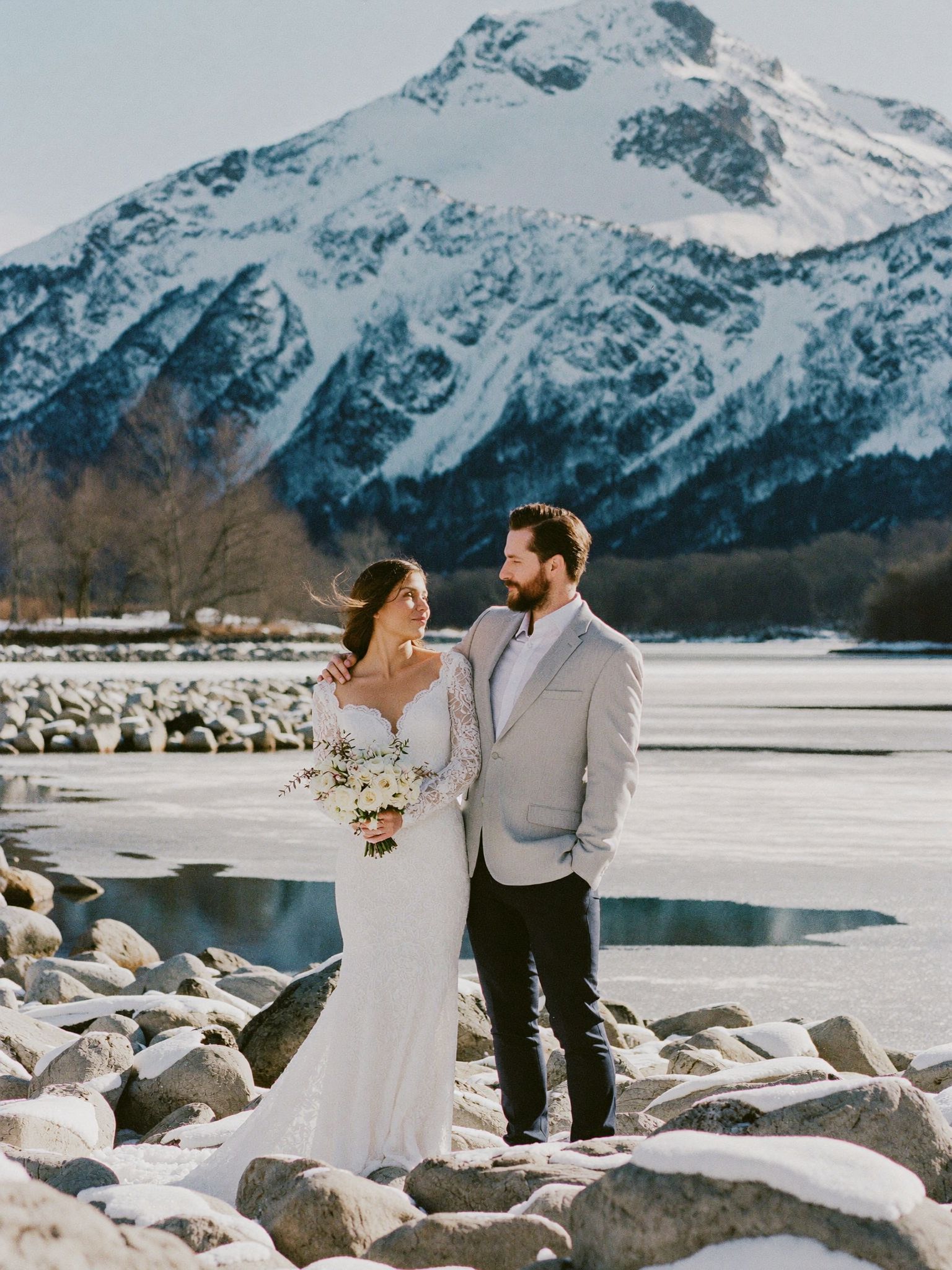 A couple at the end of a long day in the Rockies under evening light