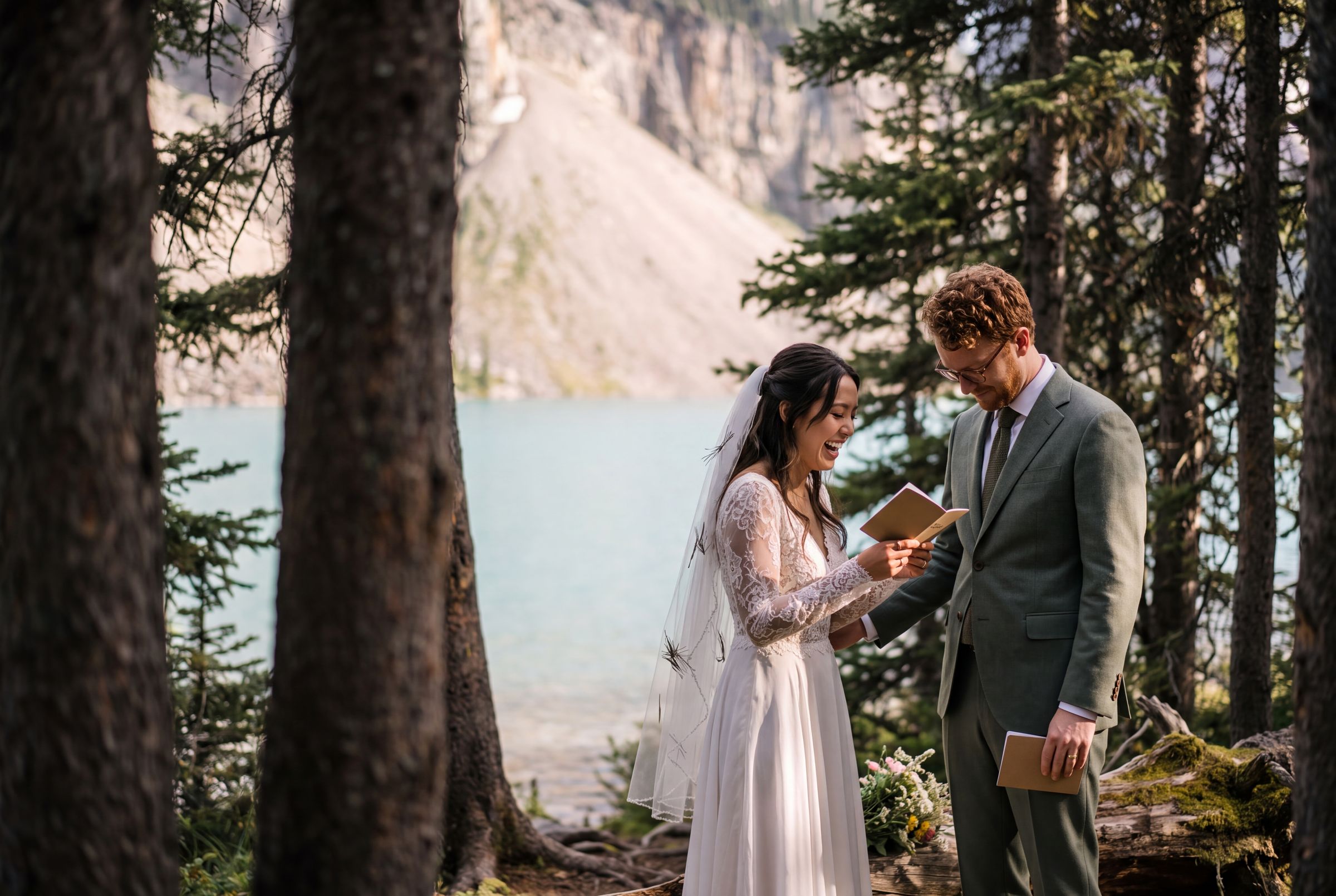 A small ceremony among the trees beside a mountain lake in Jasper
