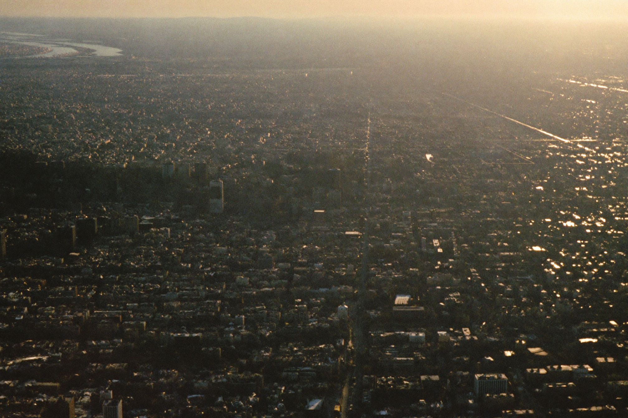 An aerial view of Mexico City with wide avenues running through it