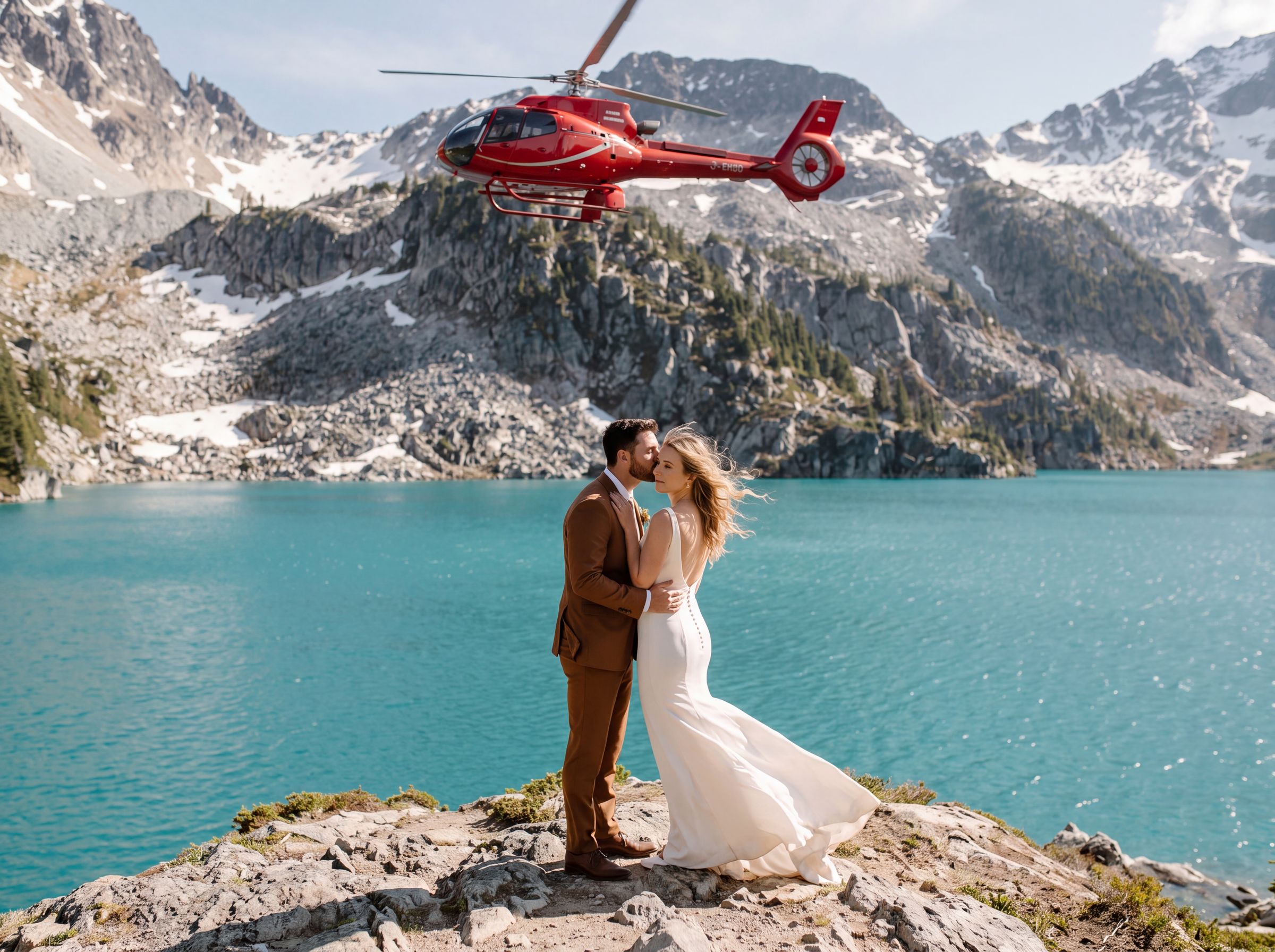 A couple during their Whistler helicopter elopement beside a turquoise alpine lake