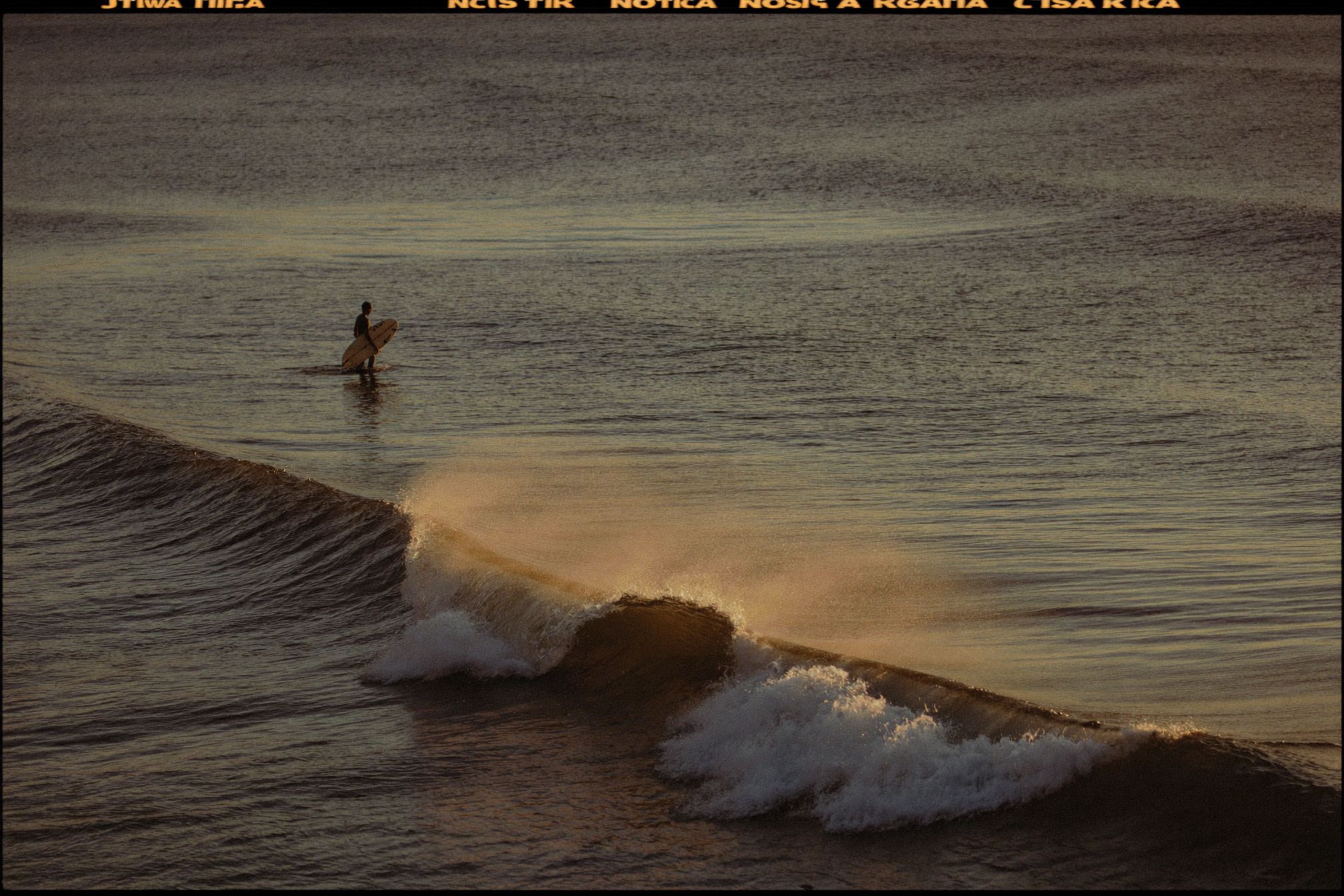 One surfer on one wave with nobody else in the water