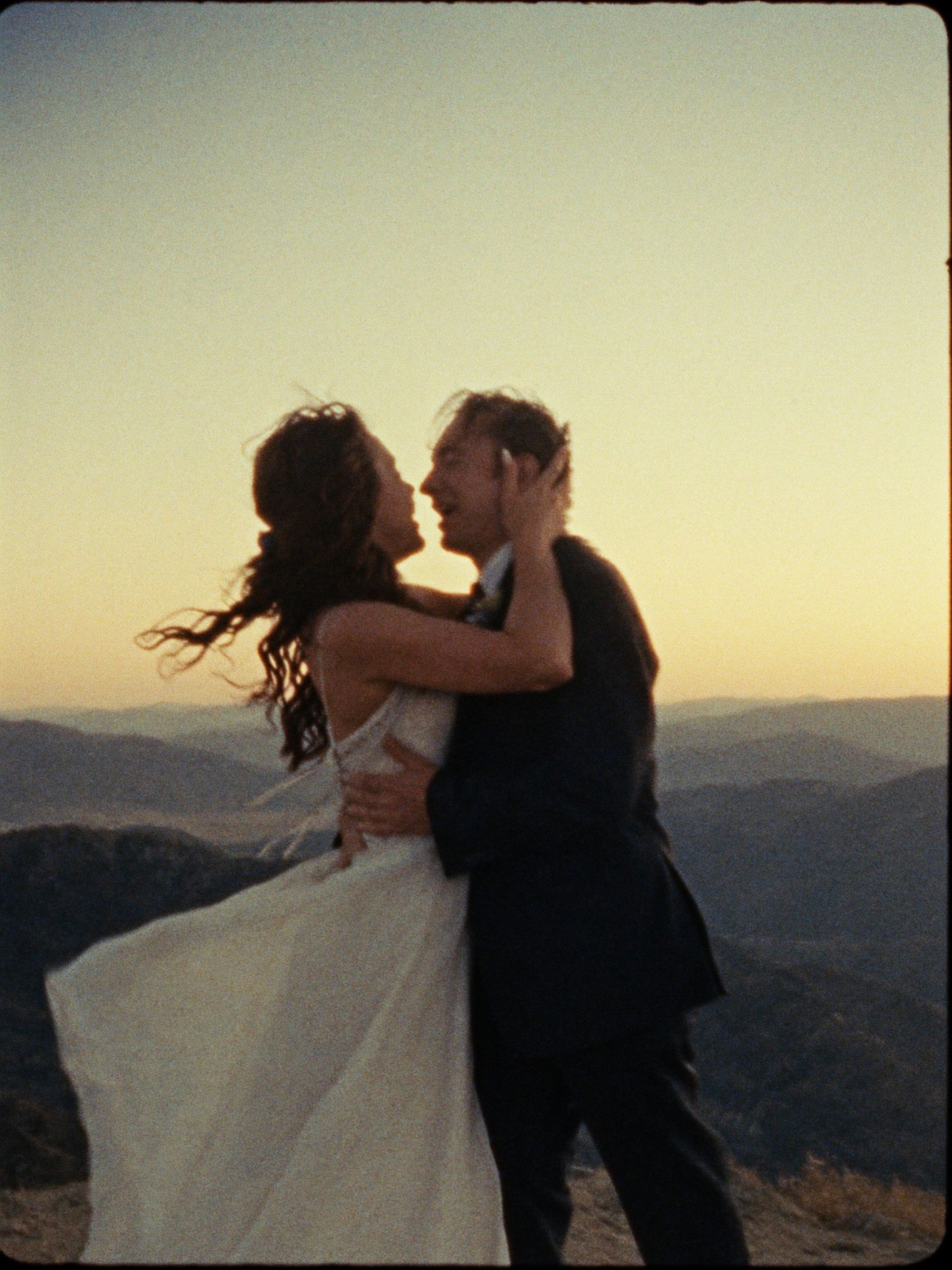 A newly married couple at their elopement at golden hour