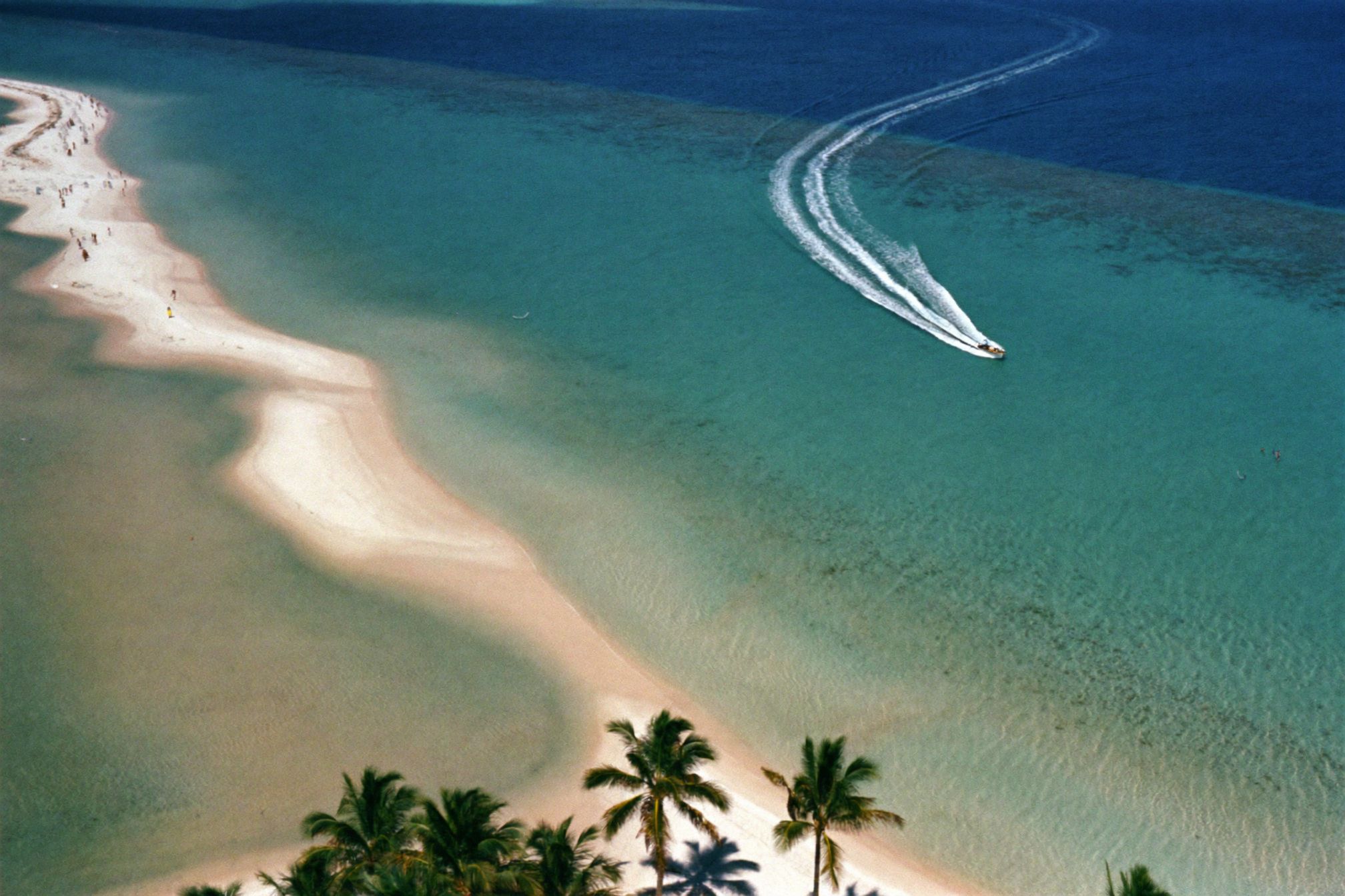 The Cancún coastline seen from the air with the lagoon behind the beach