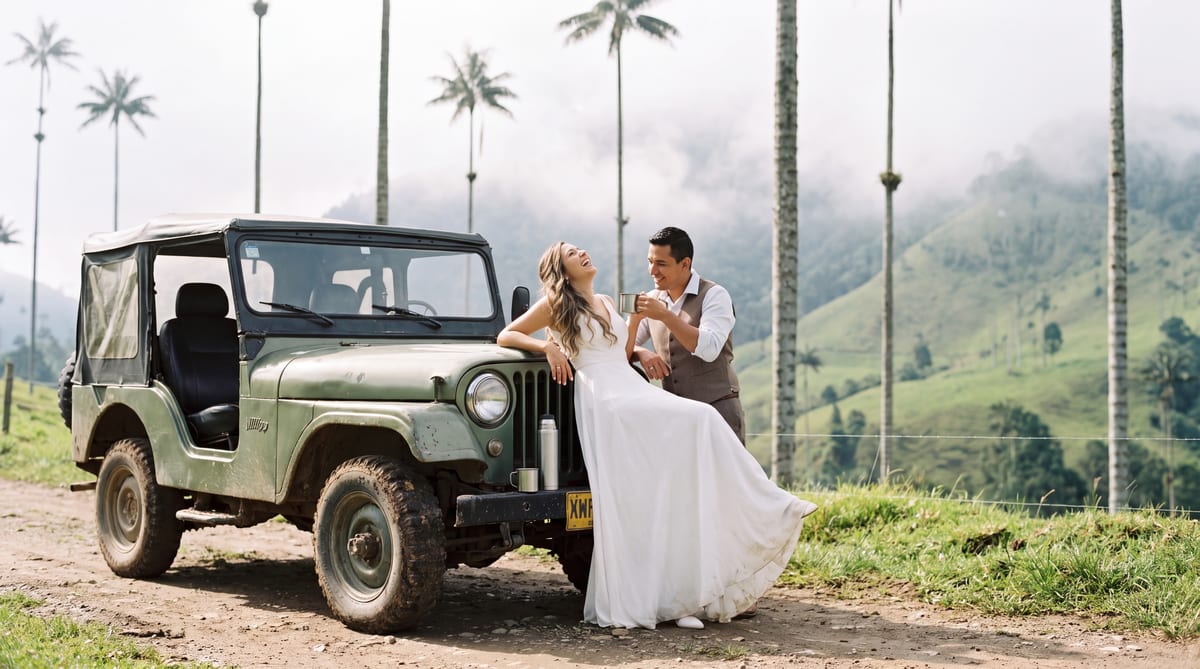 A vintage Willys jeep beneath the Cocora wax palms