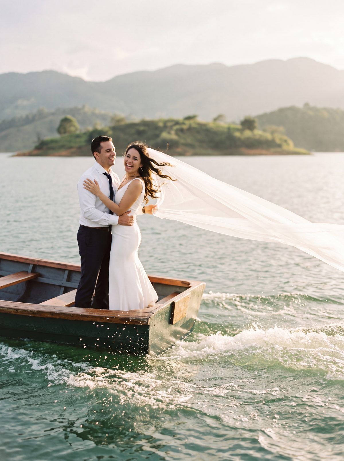 Couple on a wooden boat among the green islands of Guatap&eacute;