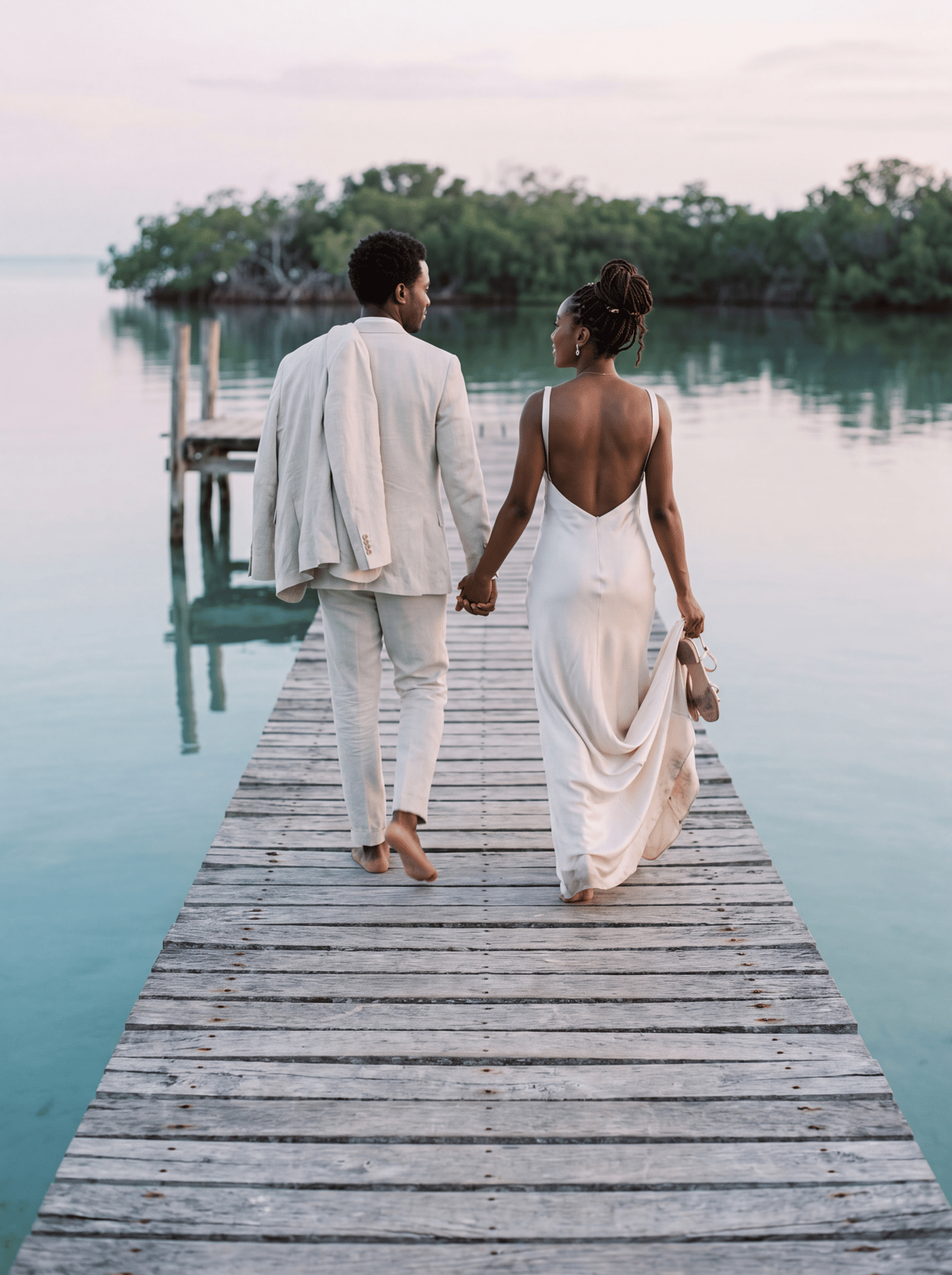 Couple on a private island dock in the Rosario Islands
