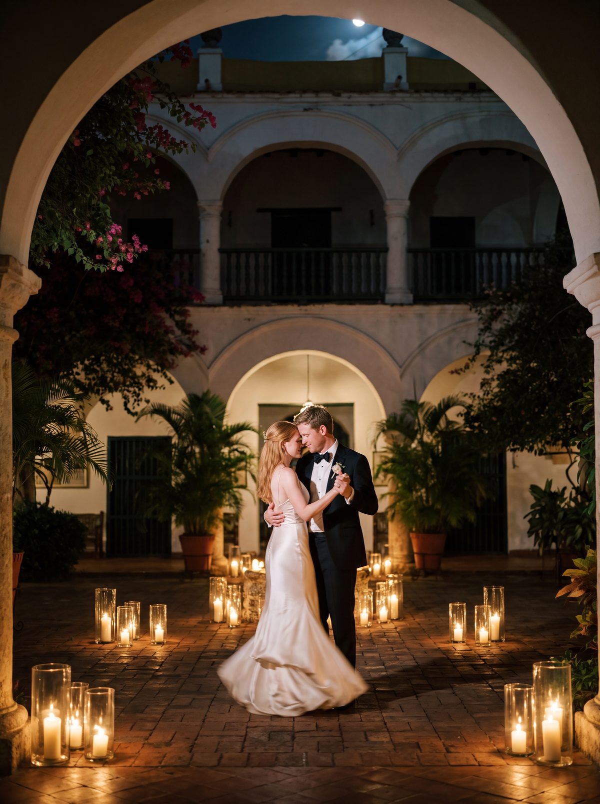 Couple in a candlelit colonial courtyard in Cartagena