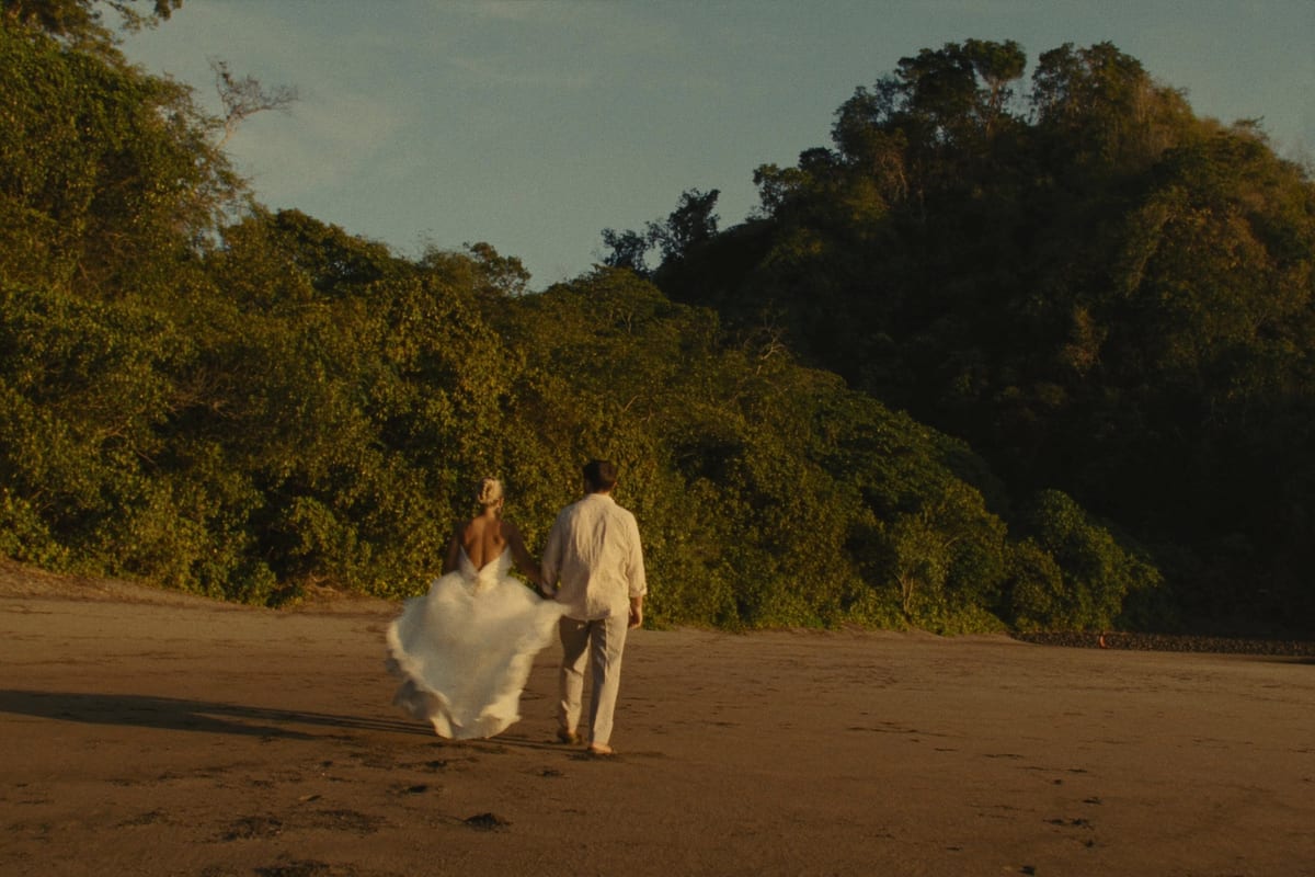 Surf rolling onto a jungle-backed beach at Nosara